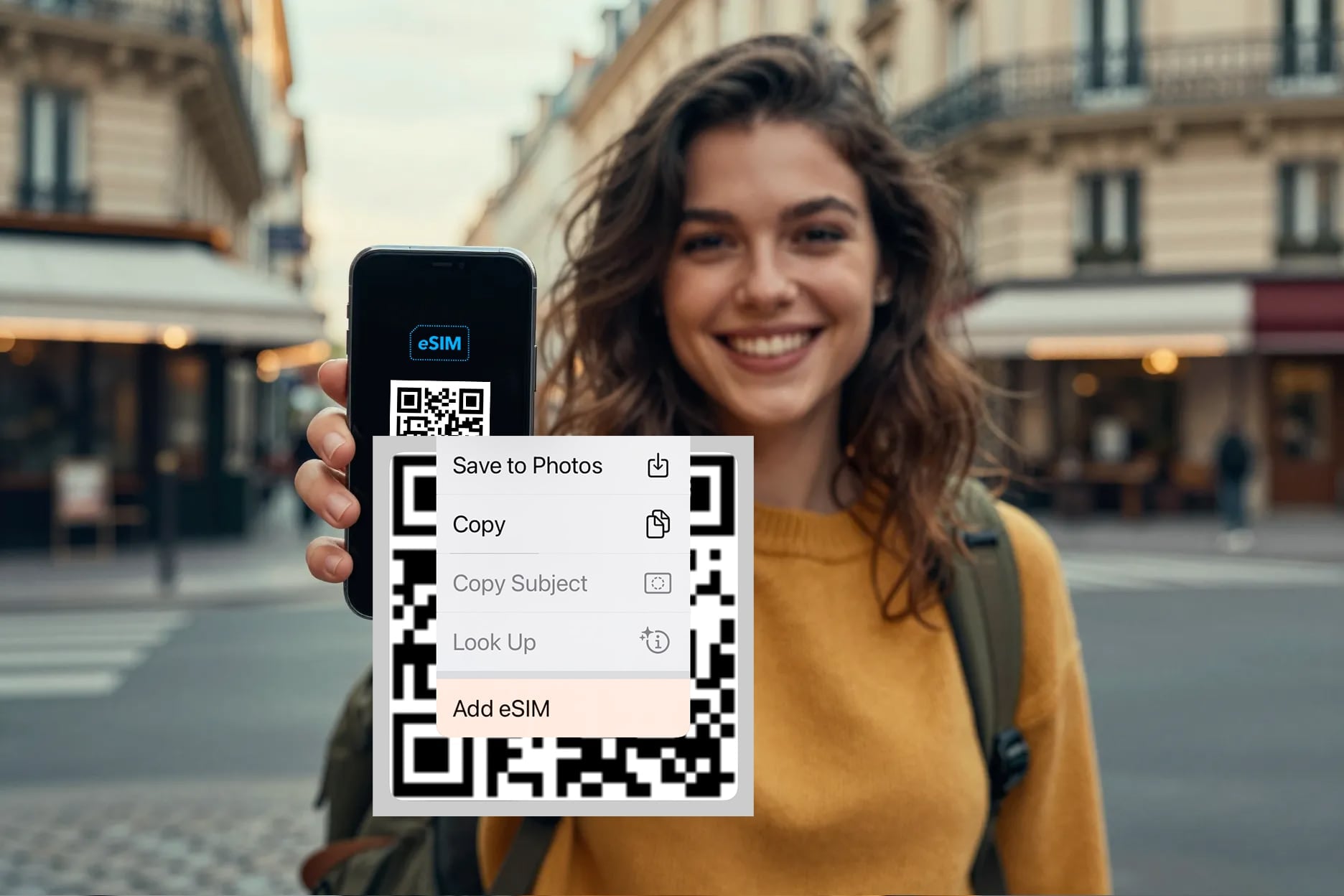 iPhone showing the Add eSIM prompt after long-pressing a QR code in the Mail app